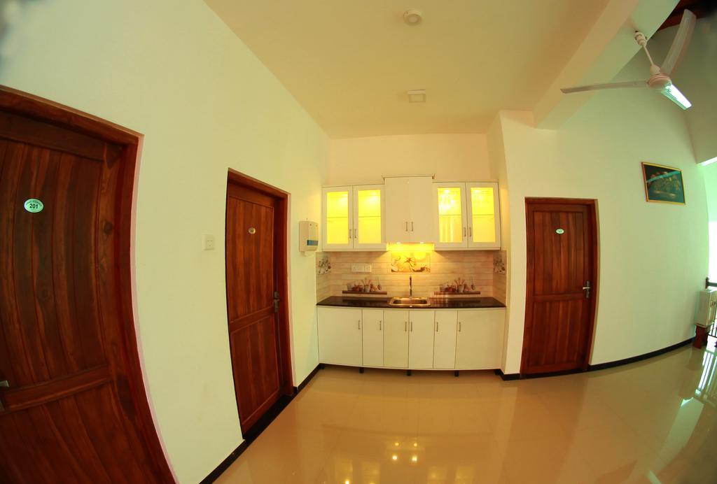 Grand Residence Тангале Екстериор снимка